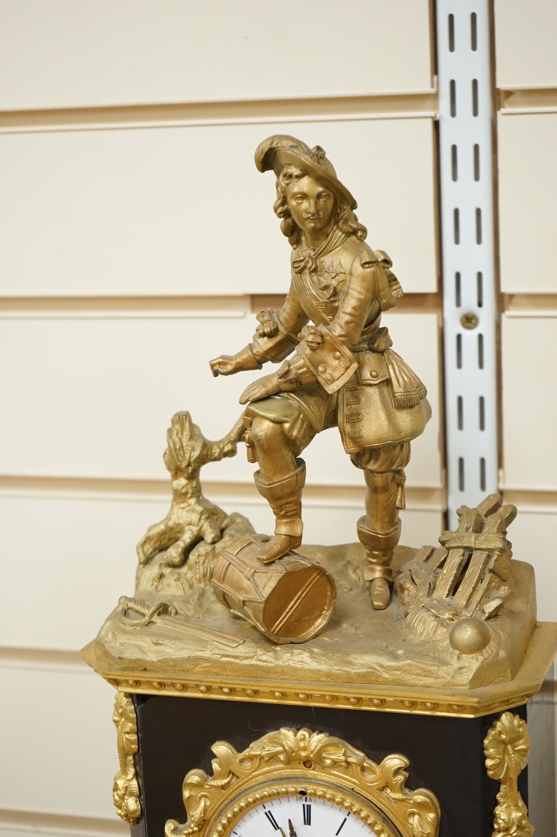 A 19th century French gilt metal mantel clock and stand, 56cm total
